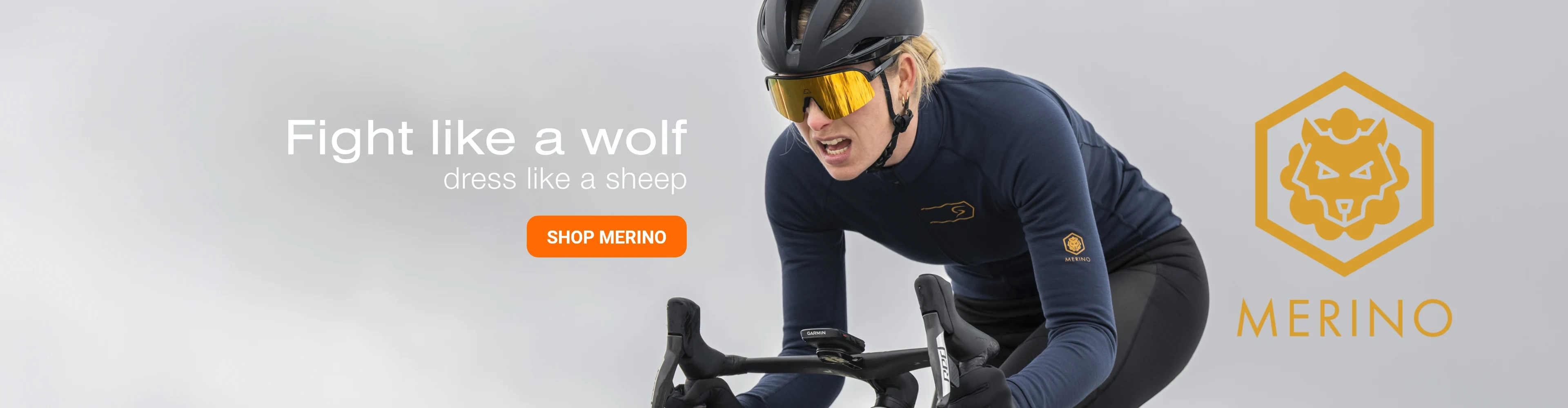 A cyclist wearing Merino apparel and helmet is featured in a promotional banner with the text 'Fight like a wolf, dress like a sheep'.